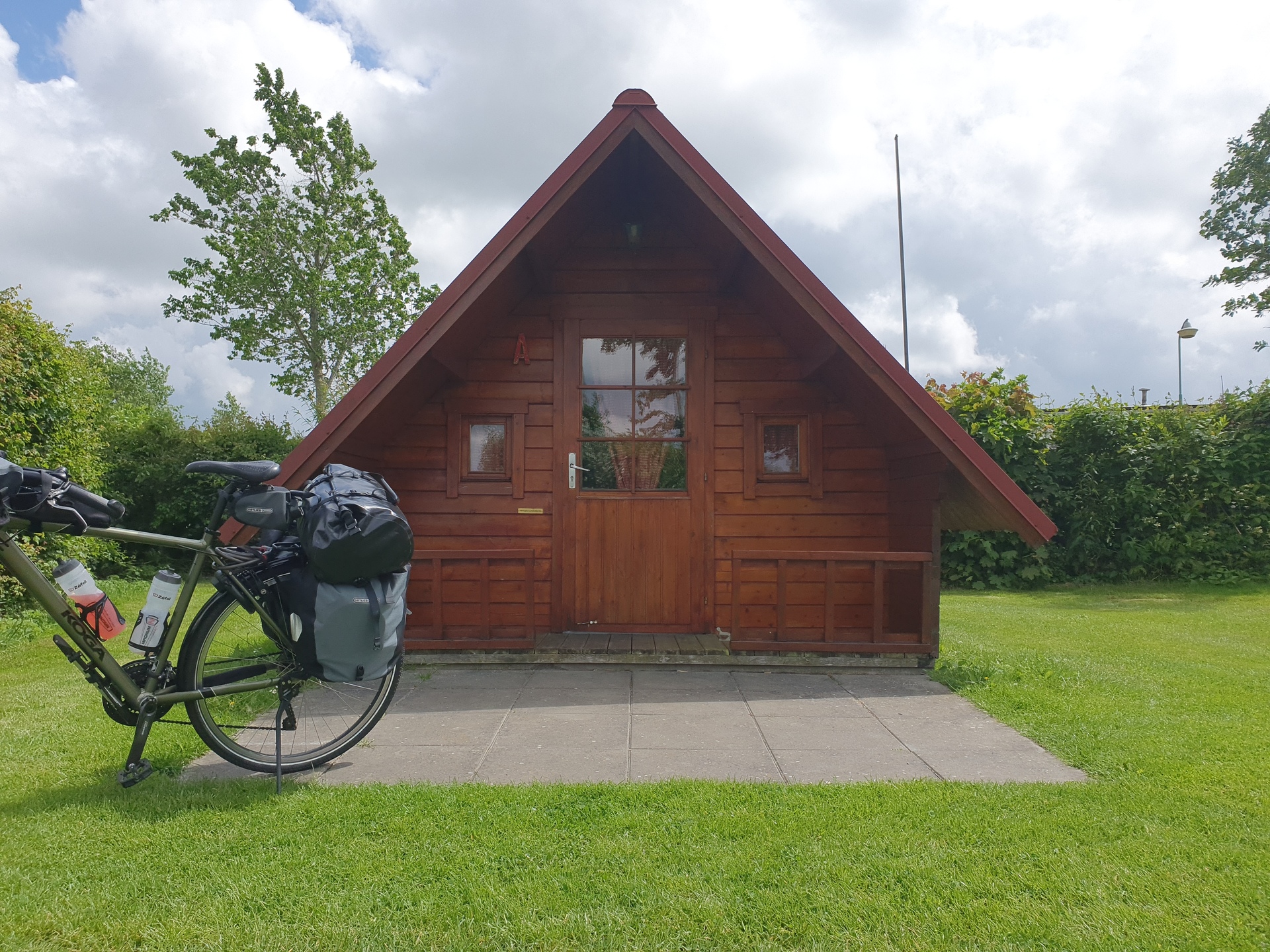 Sleeping cabin with my touring bike in front of it