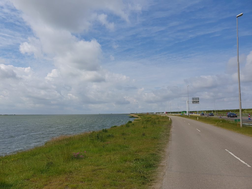 Crossing the Afsluitdijk with the IJsselmeer left, and the motorway A7 right